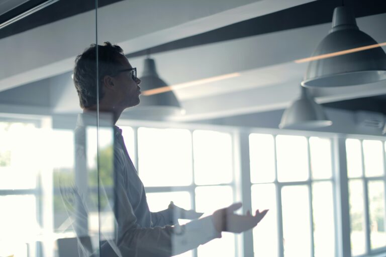 Man speaking in an office meeting room